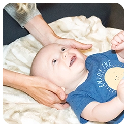 Chiropractic Excelsior MN Happy Baby Being Adjusted